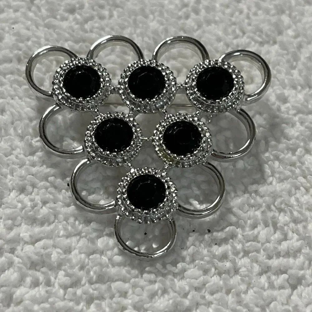 Vintage Sarah Coventry triangle open design black glass brooch